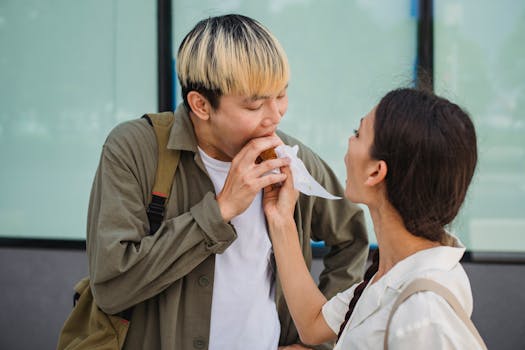 A young couple enjoying a delicious street food snack together outdoors.