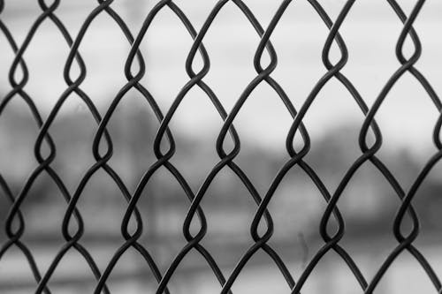 Close Up Shot of Grey Metal Chain Link Fence