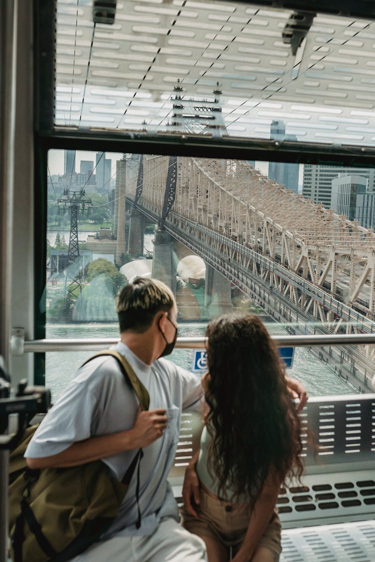 Couple Riding In Funicular Under River