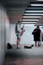 Street Musician Playing Saxophone in Underground