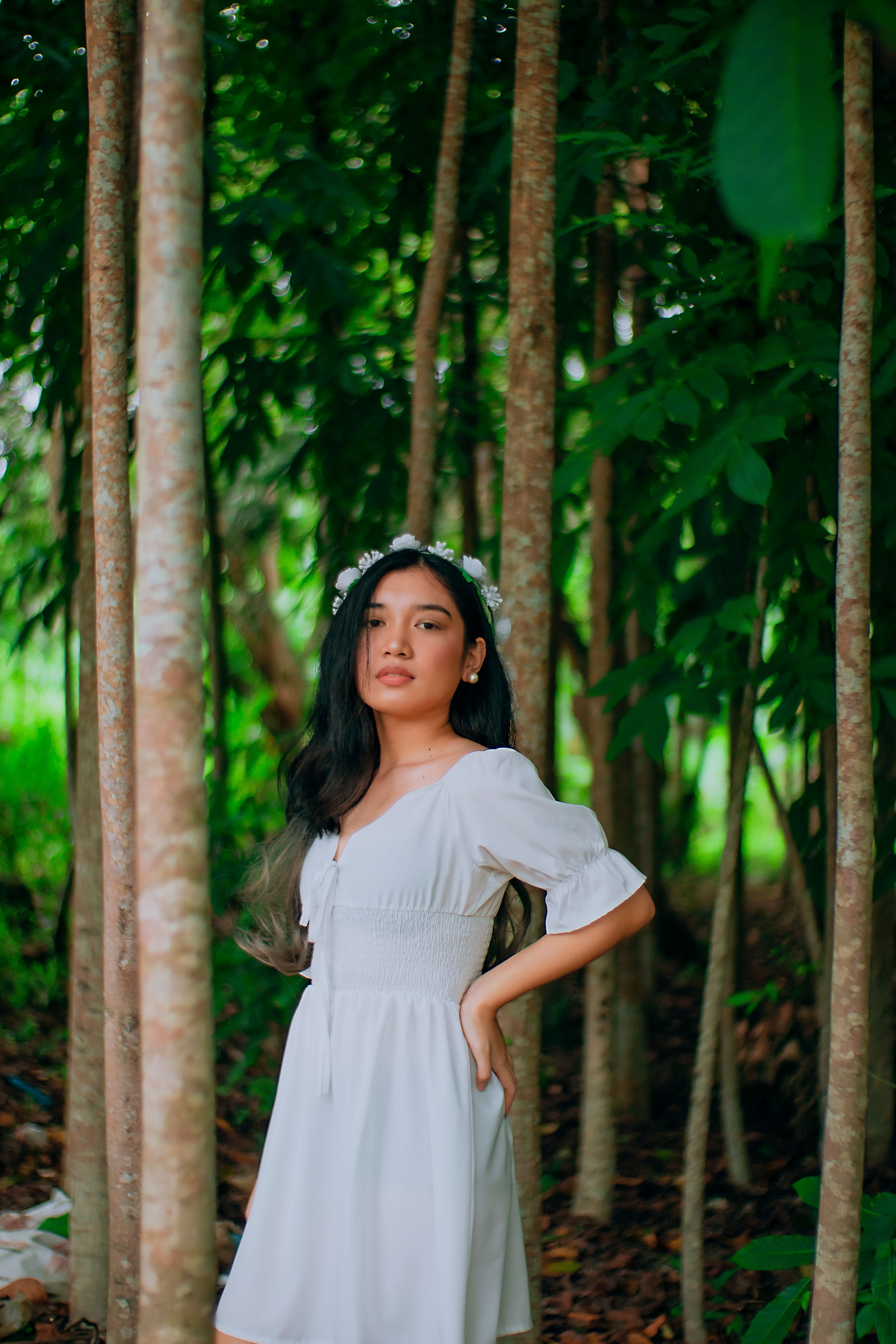 Woman in White Dress Standing Near Trees · Free Stock Photo