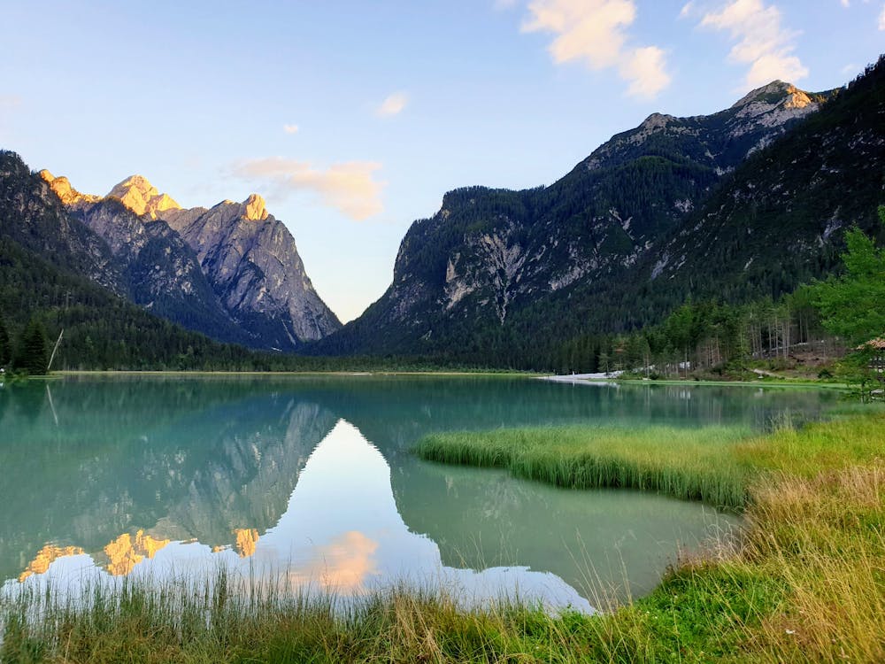 A Lake Near the Mountain Ranges · Free Stock Photo