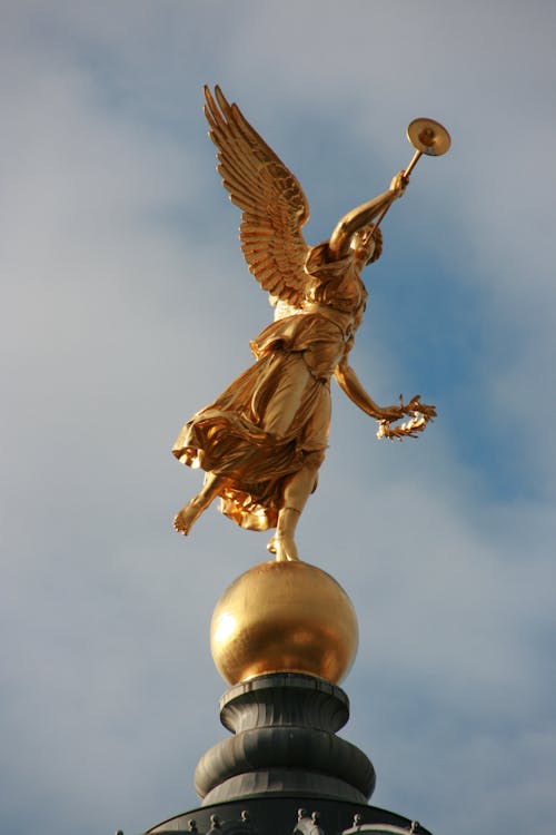 Free Gold Angel Statue Under Blue Sky Stock Photo