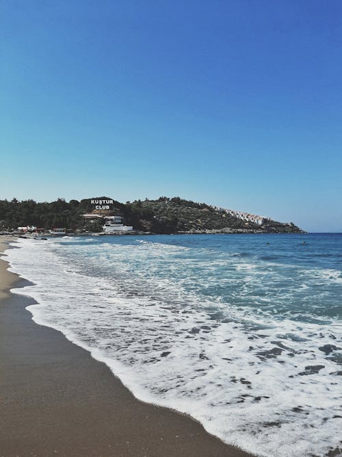 Blue Sea Waves Crashing on Shore