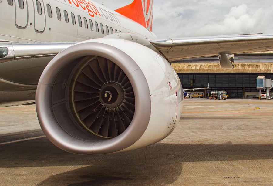 Close view of a jet engine intake and fan blades