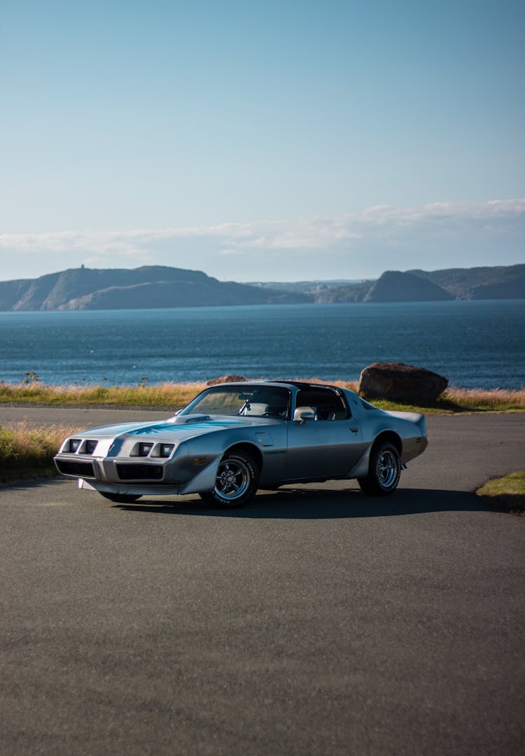 Retro Automobile On Coast Of Lake