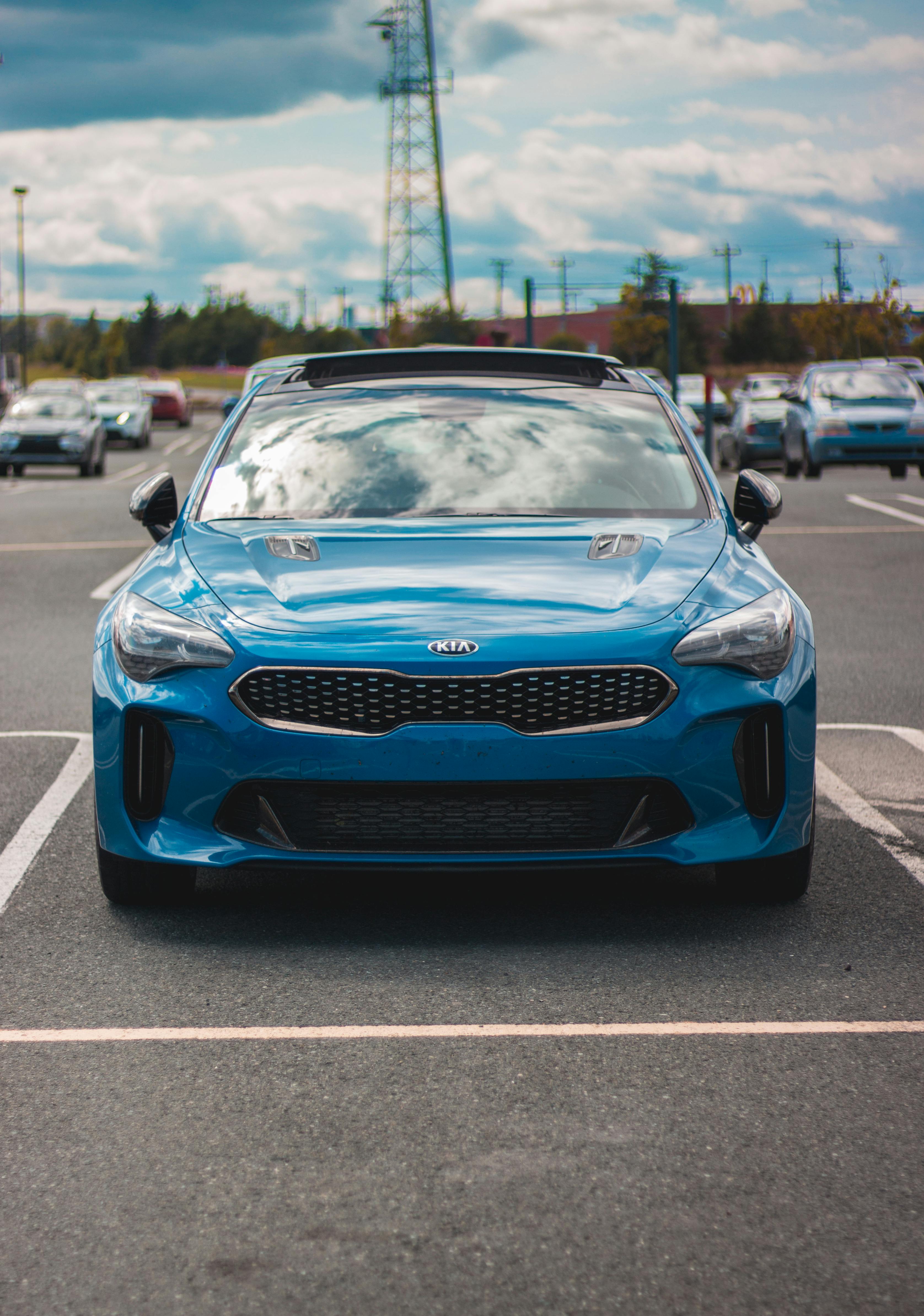tuned sports car on parking in daytime