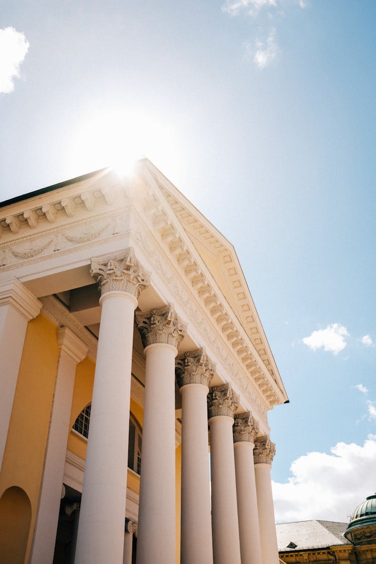 Grand Theater Exterior With Pillars And Stucco