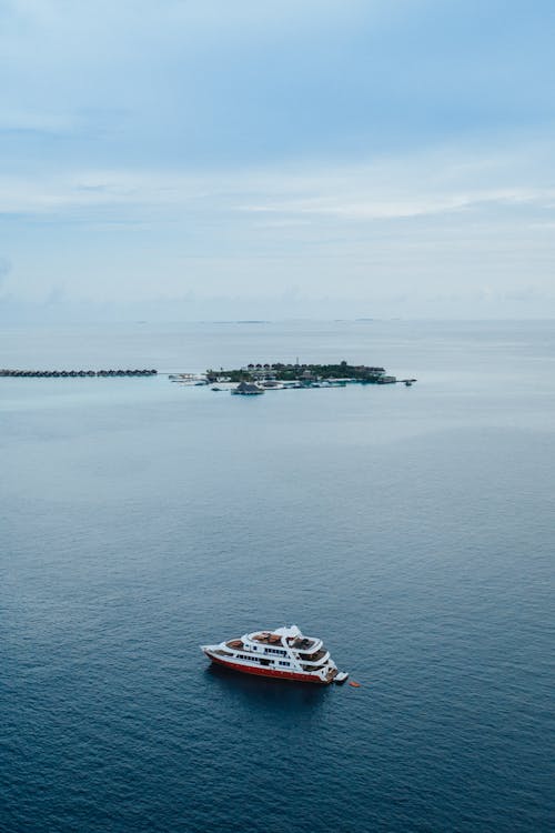 Foto profissional grátis de à beira-mar, aéreo, água do mar