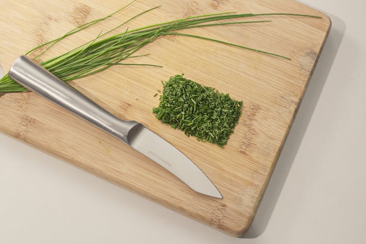  A Sliced Chives On A Chopping 