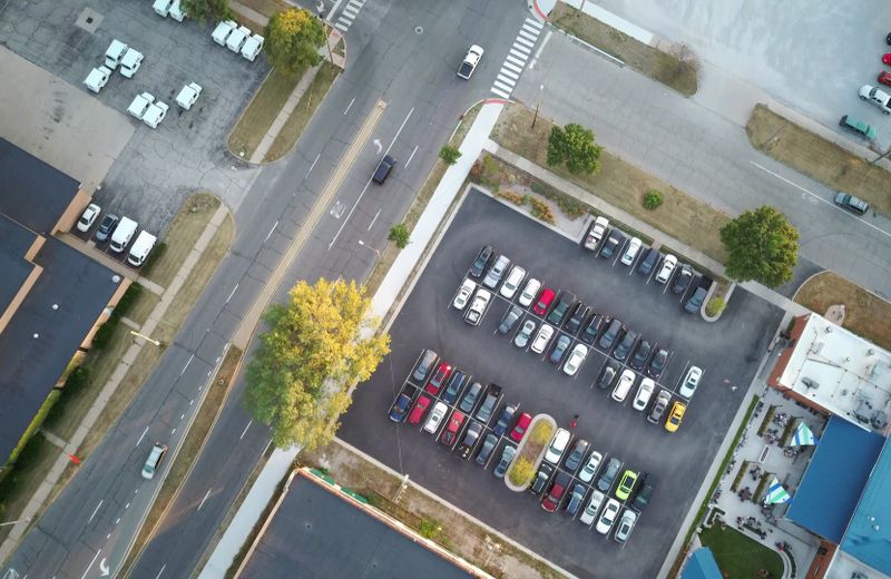 Aerial view of a maintained asphalt parking lot