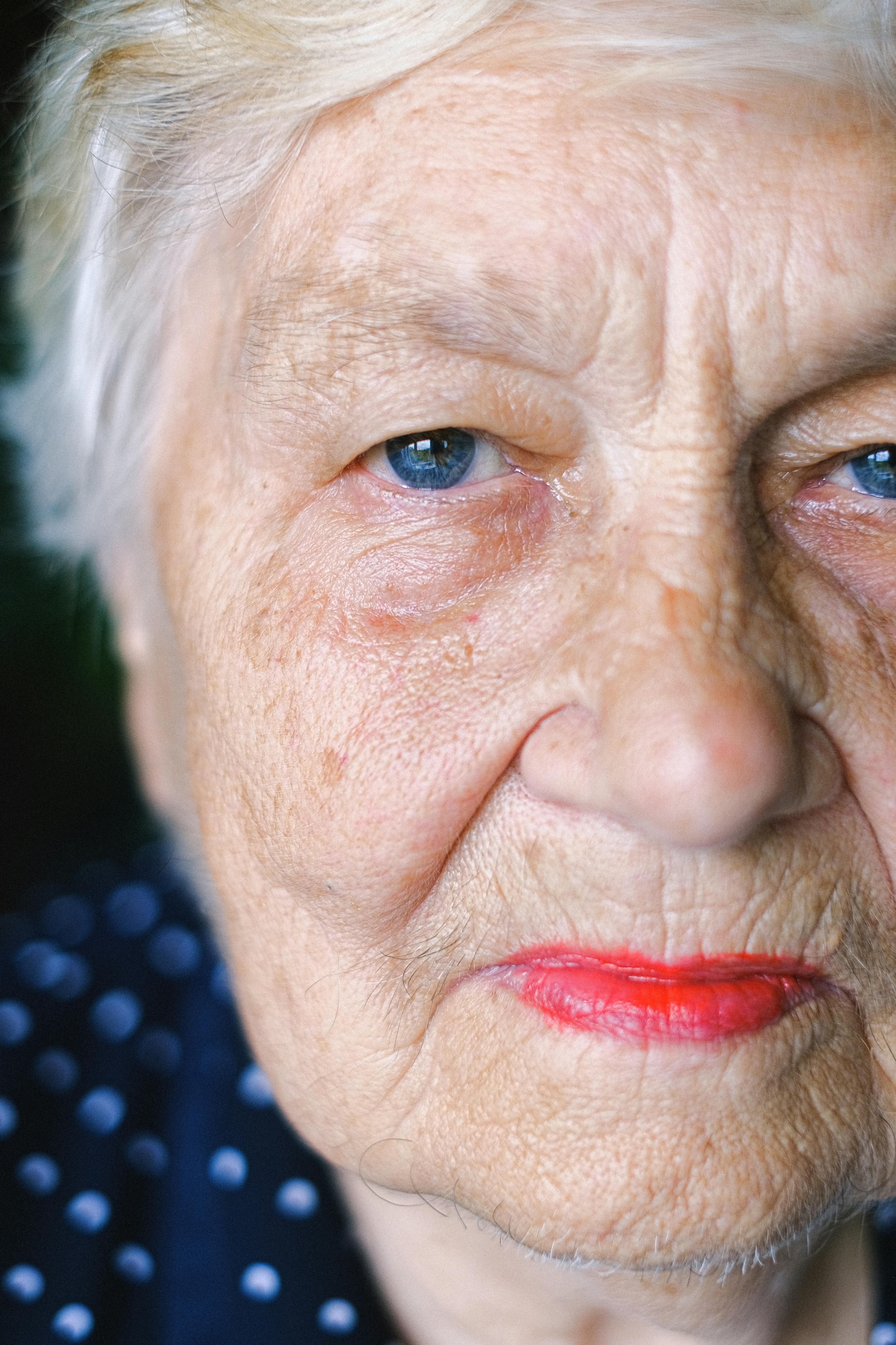 crop elderly woman with gray hair