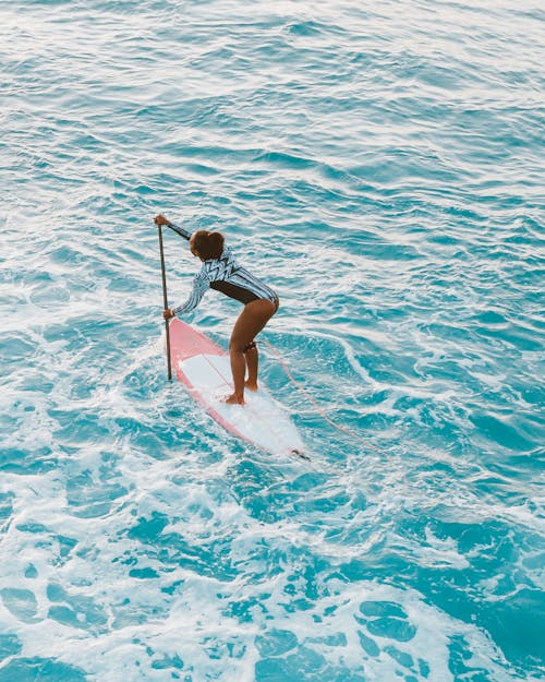 A Woman Doung Surfing 