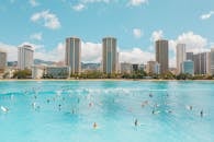 People Swimming on Beach