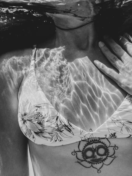 Close-up of Woman with Tattoo Underwater