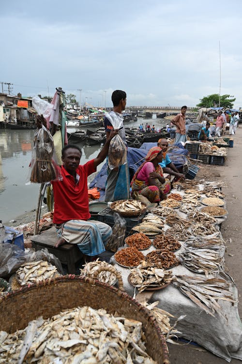 Free Vendors Selling  Dried Fish  Stock Photo