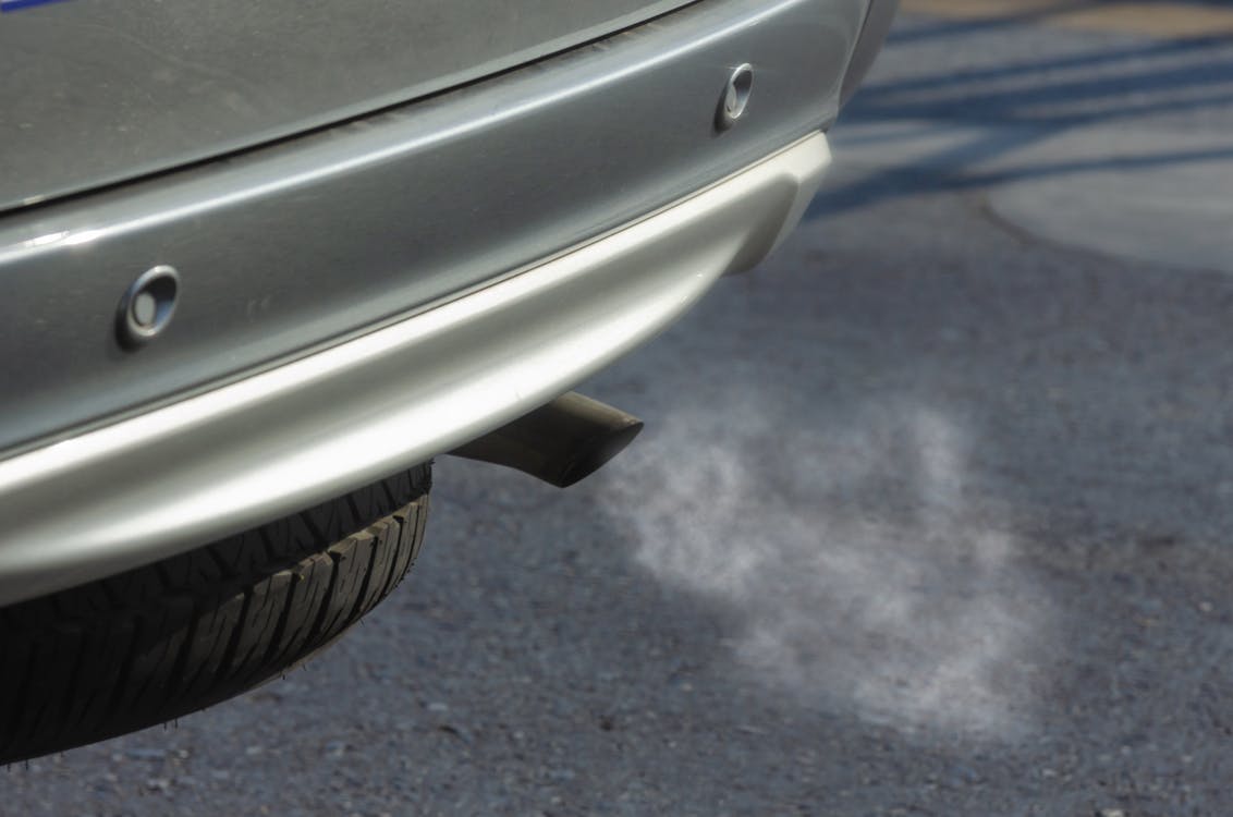 Free Silver Car with Black Exhaust Pipe Stock Photo