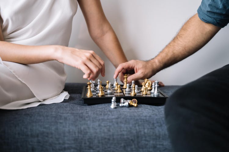 People Playing Board Game