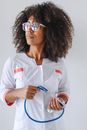 Woman in White and Red V Neck Shirt Wearing Blue and White Framed Eyeglasses
