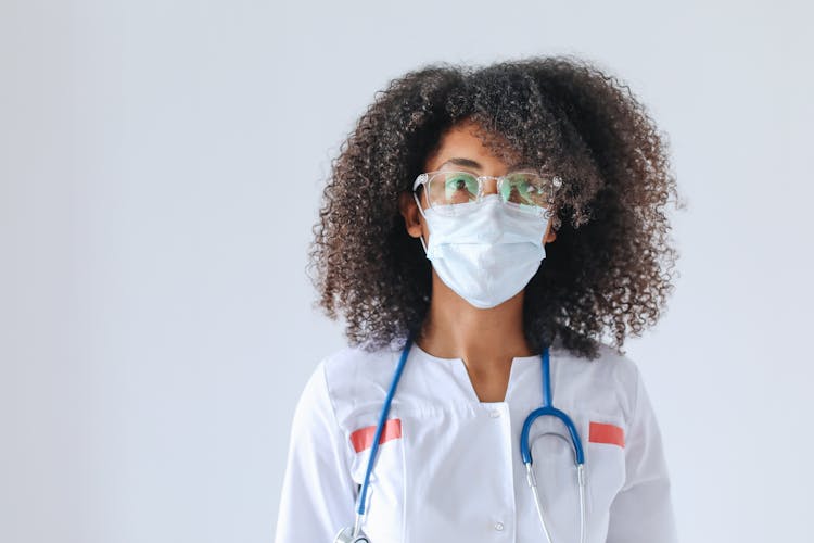 White Face Mask On Female's Face