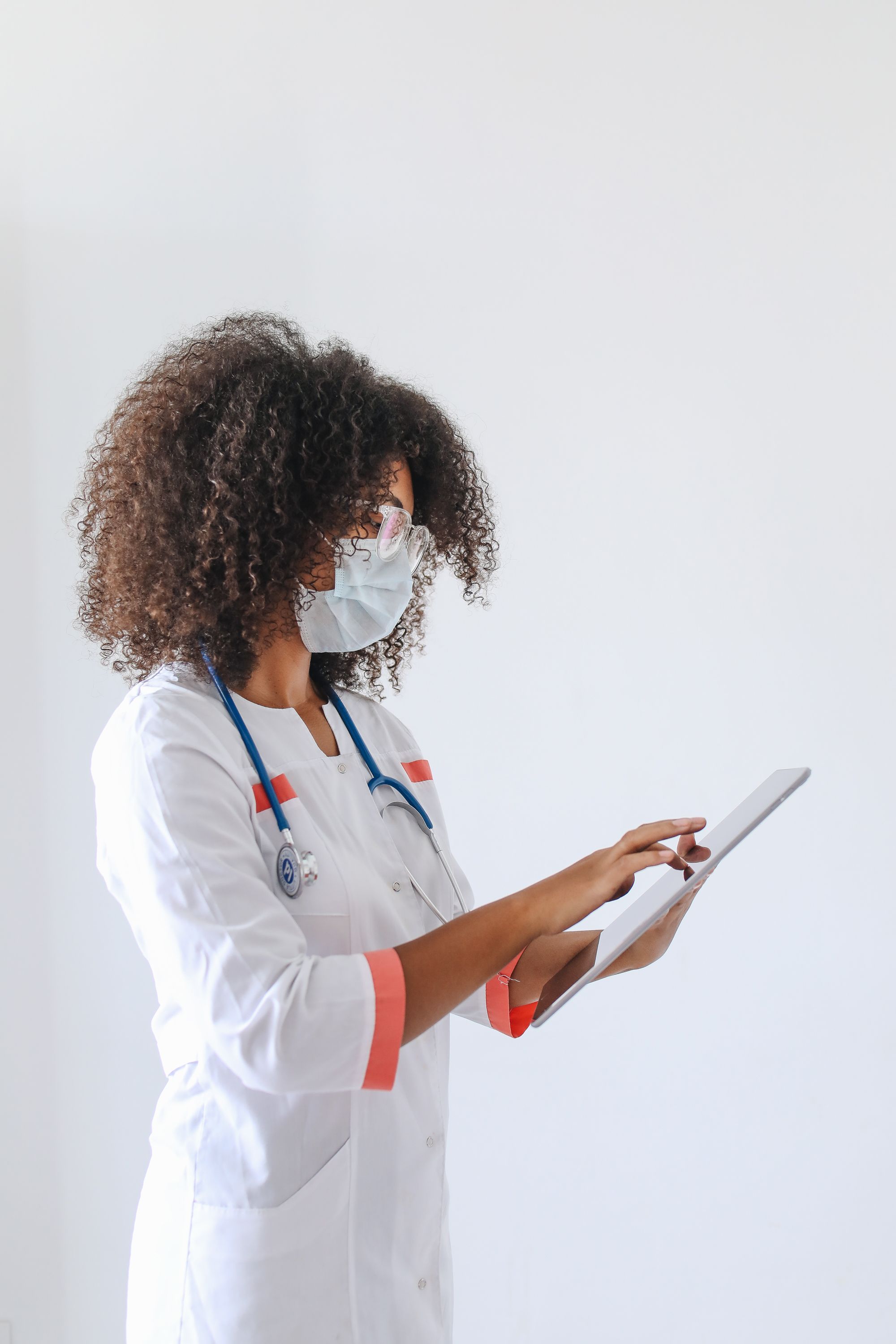 Nurse using digital tablet