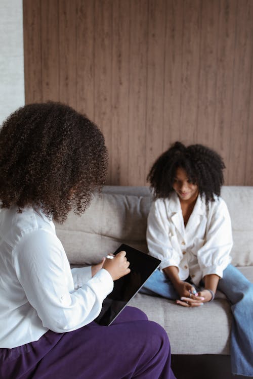 Free A Woman Having a Therapy Session with a Psychologist Stock Photo