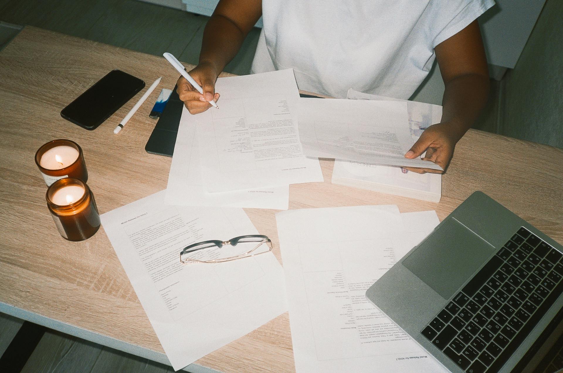 A Person Working on Documents