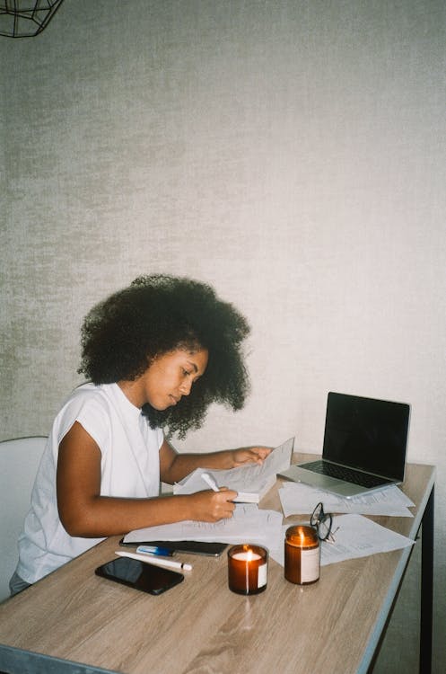  A Woman Working on Documents 