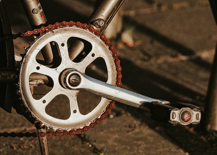 Close-up Photo Of Chain Link On Sprocket 