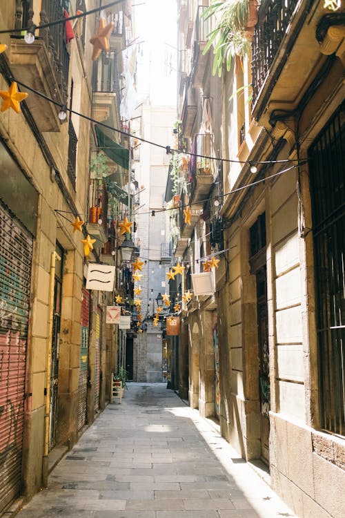 A Narrow Street Between Apartment Buildings