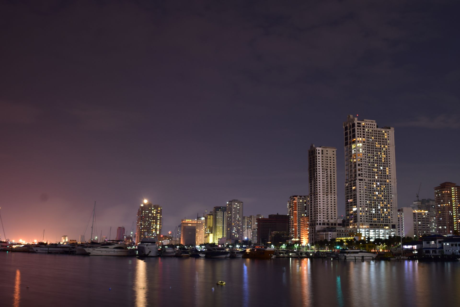 Manila bay coastline in daylight with calm sea