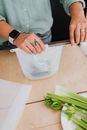 Person Holding Clear Drinking Glass