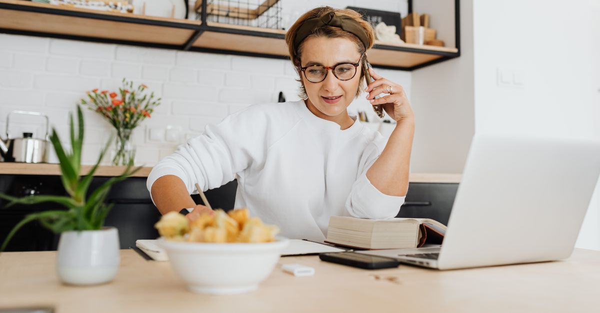 professional woman earning online certification at home desk