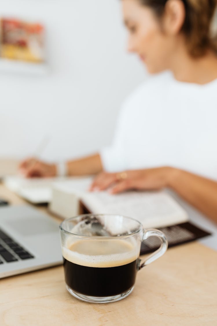 Coffee In Glass On Desk