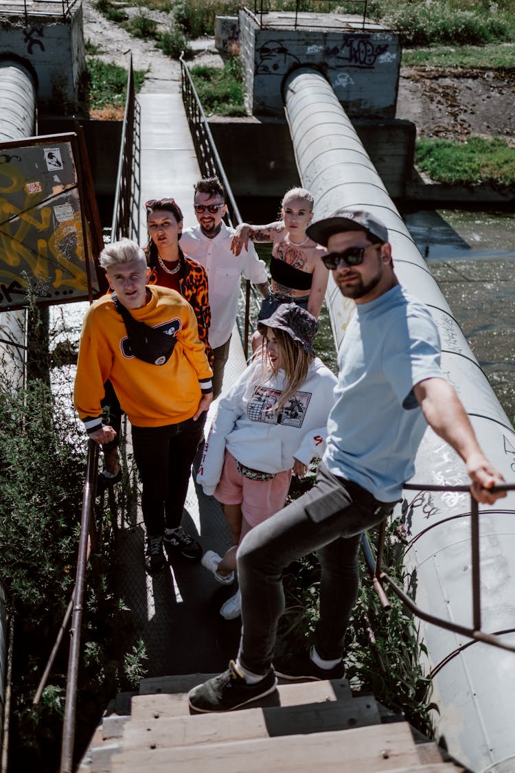 A Group Of People On A Bridge