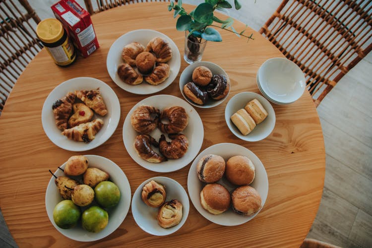 Breads On White Ceramic Plates