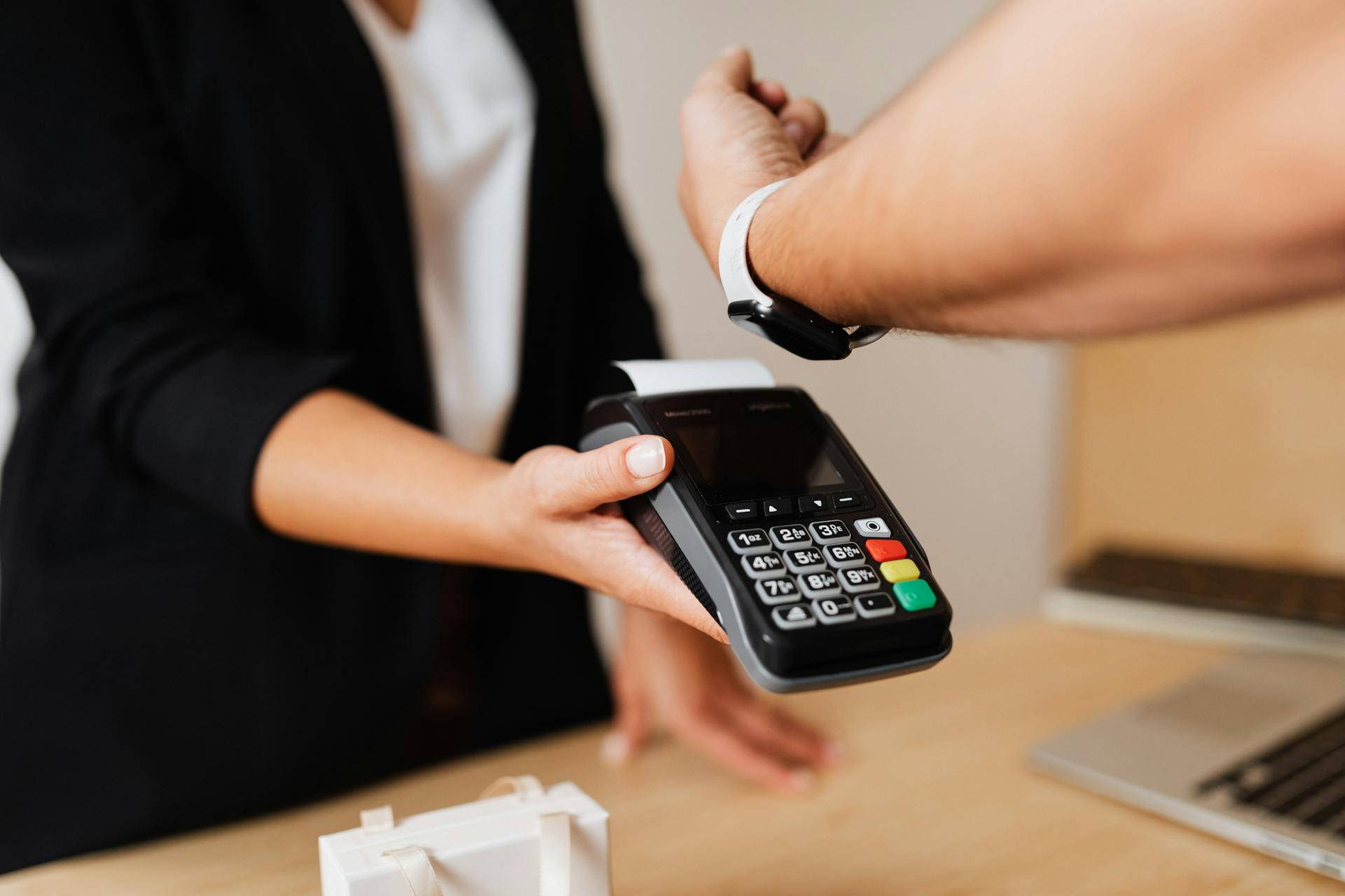 Person Paying Using Smartwatch