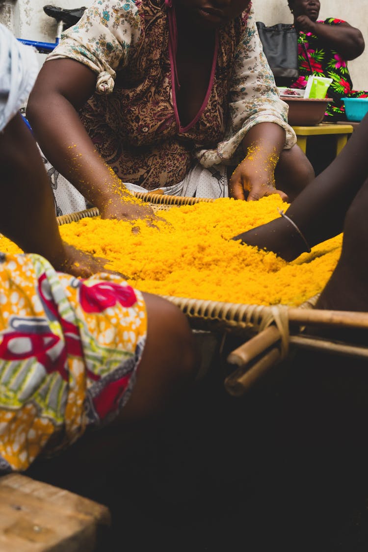 Black People Mixing Spice On Market