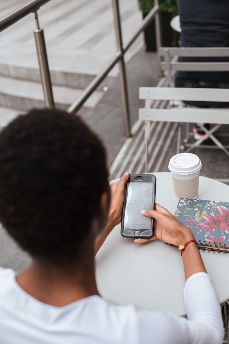 Crop Woman Messaging On Smartphone