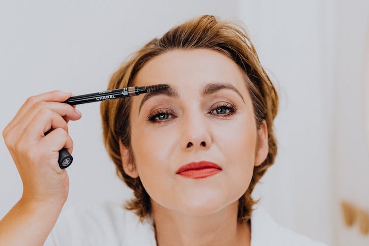 Woman Applying Makeup 