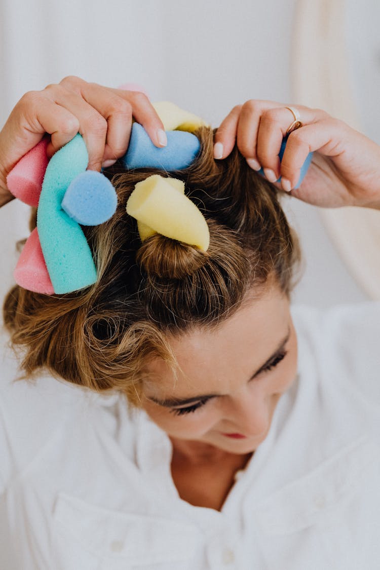 A Woman In Hair Curlers