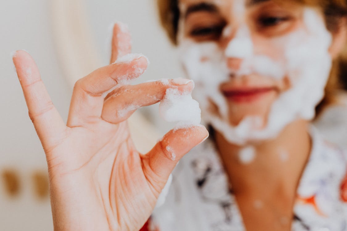 Woman With White Cream on Her Face