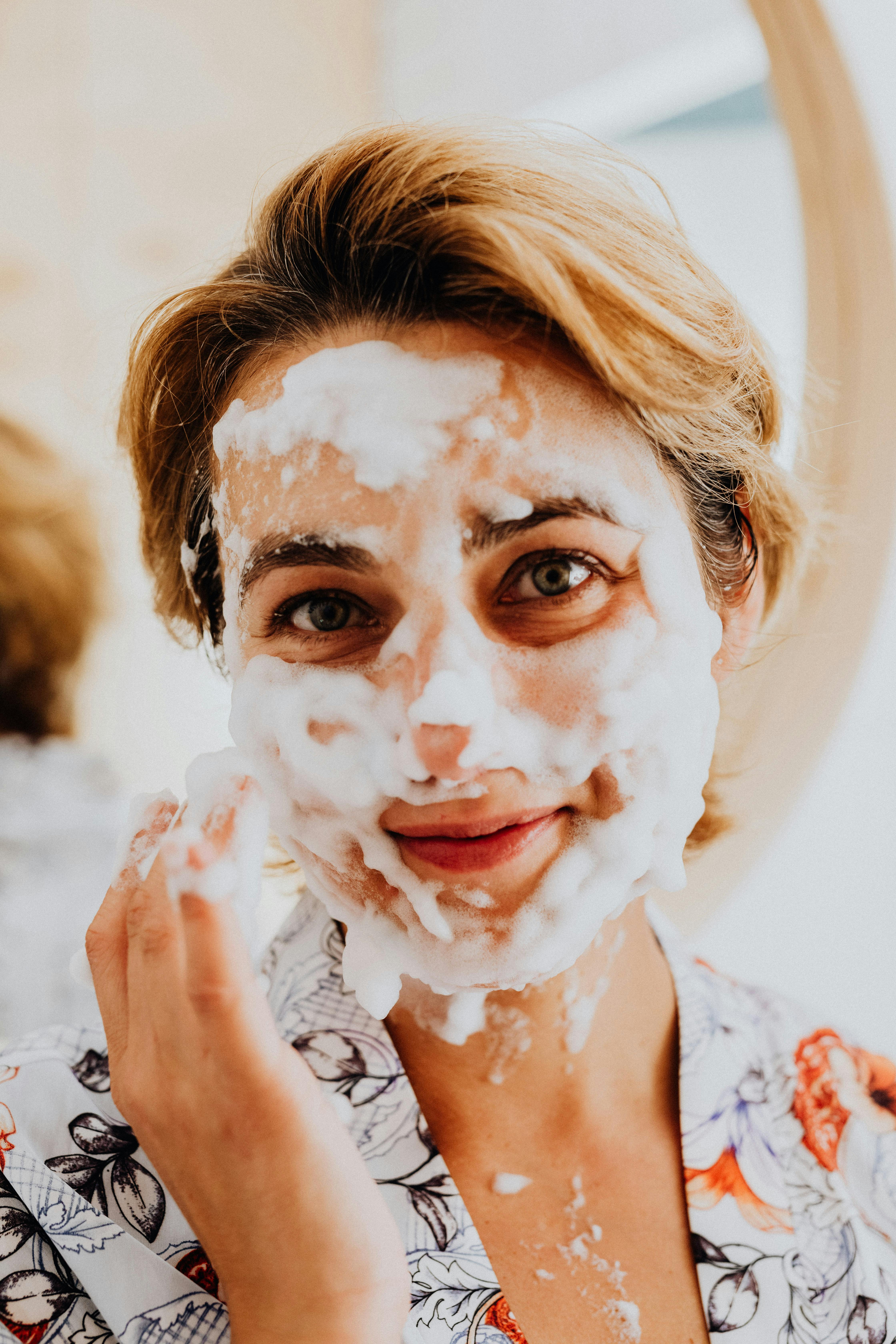 Woman With White Face Paint · Free Stock Photo