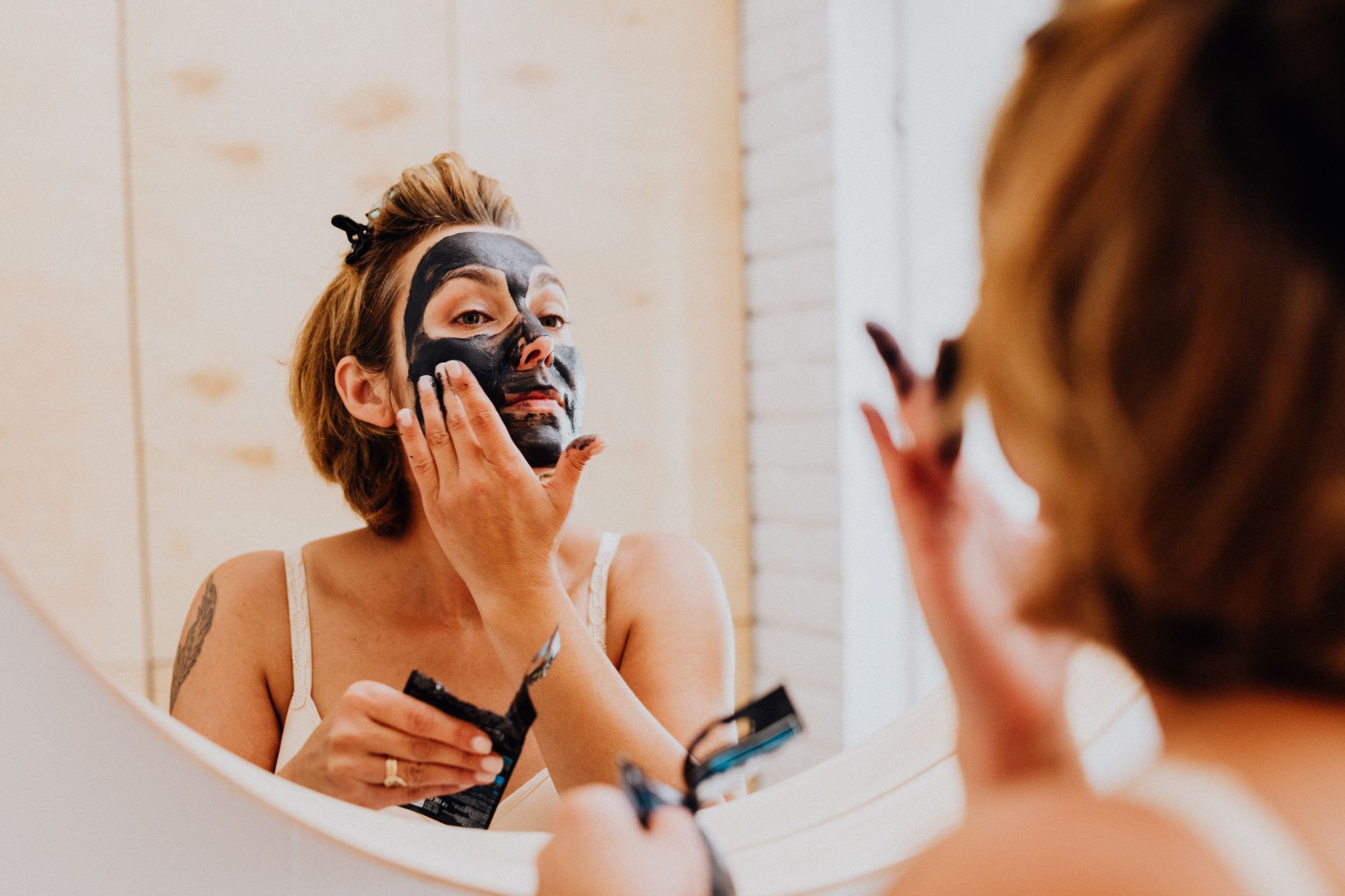 charcoal face mask application men