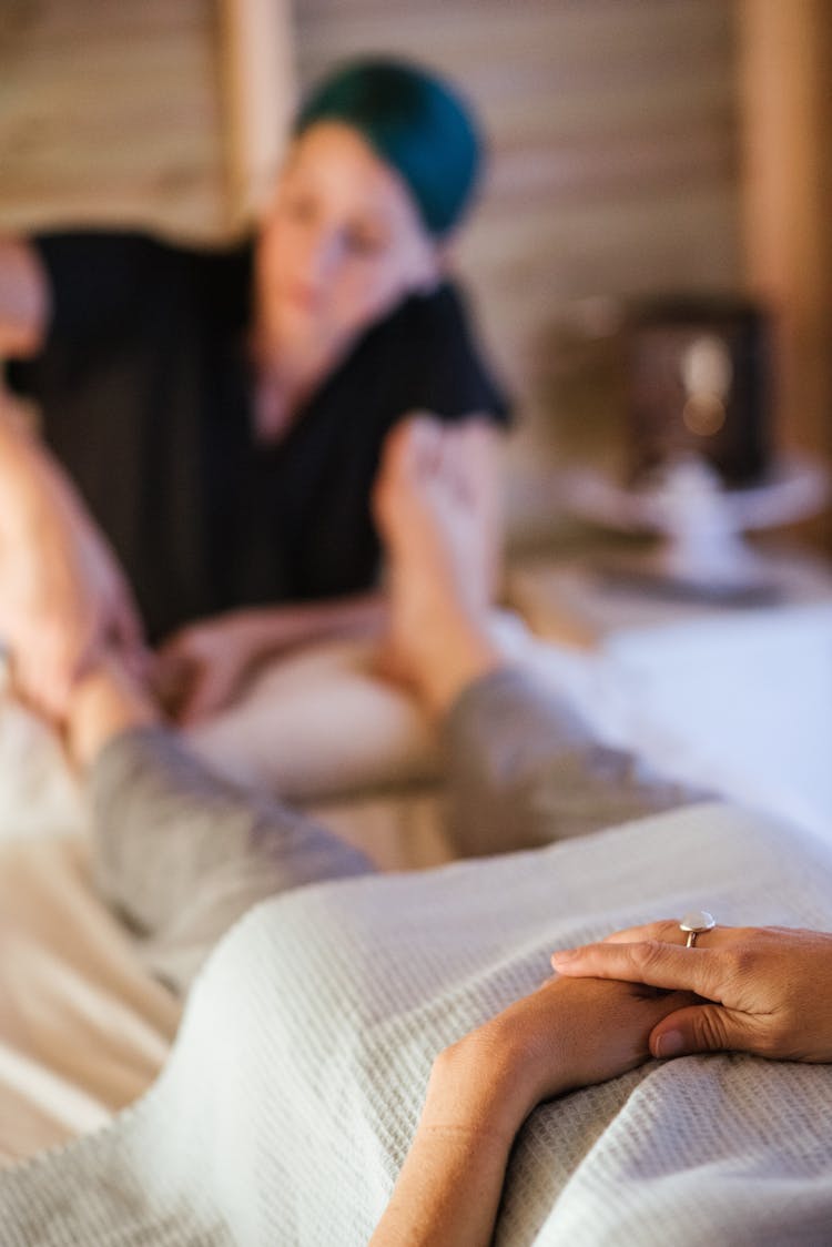 Unrecognizable Woman Getting Feet Massage