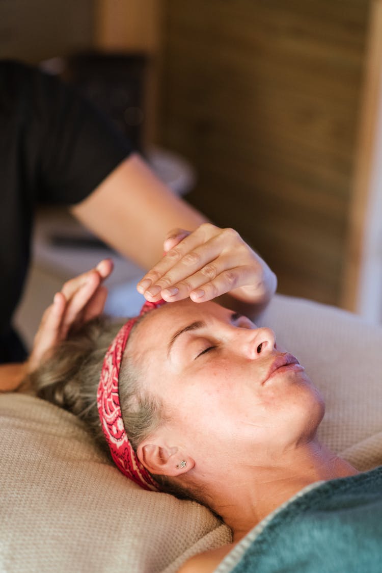 Relaxed Woman Getting Alternative Massage