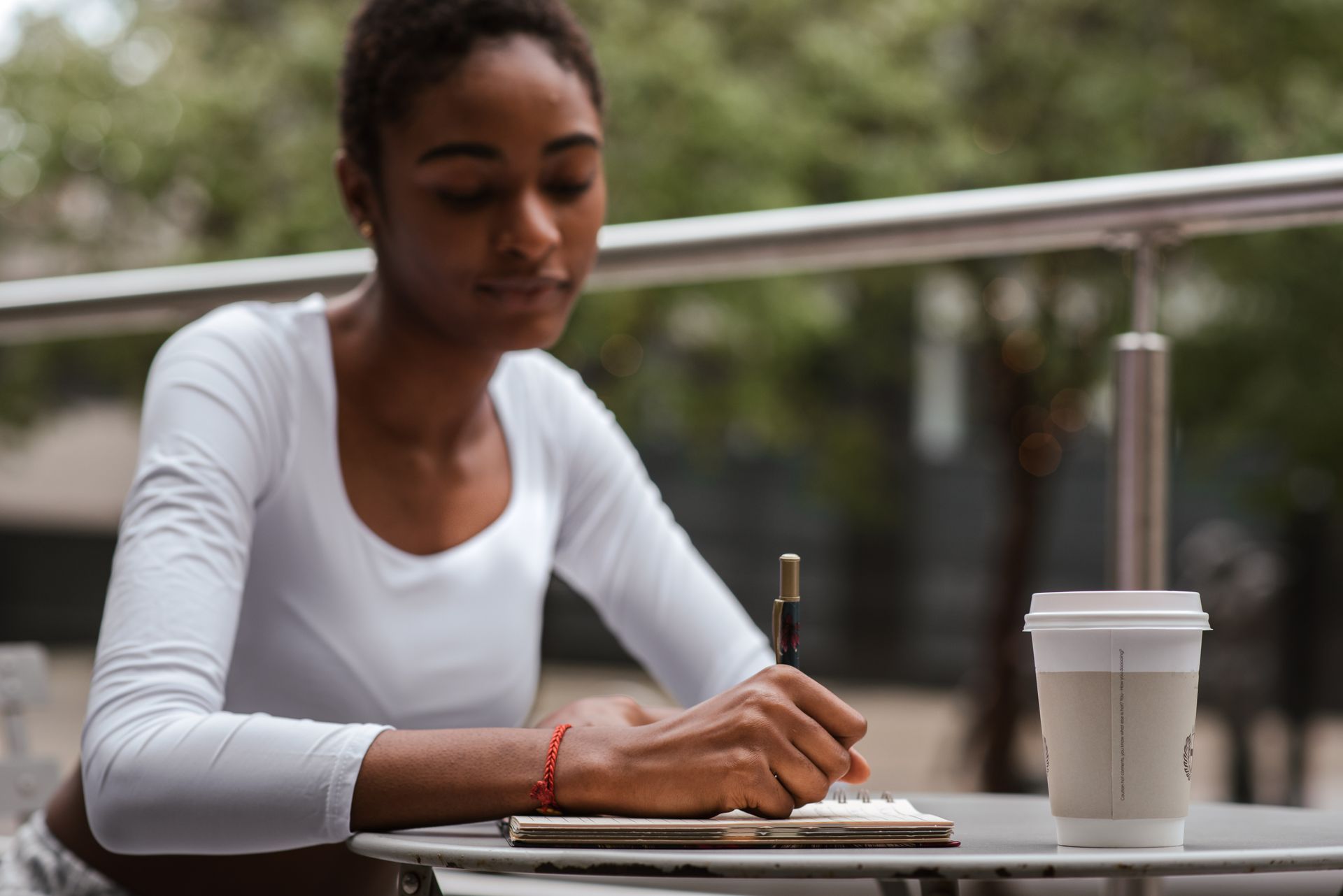 A woman writing in her journal