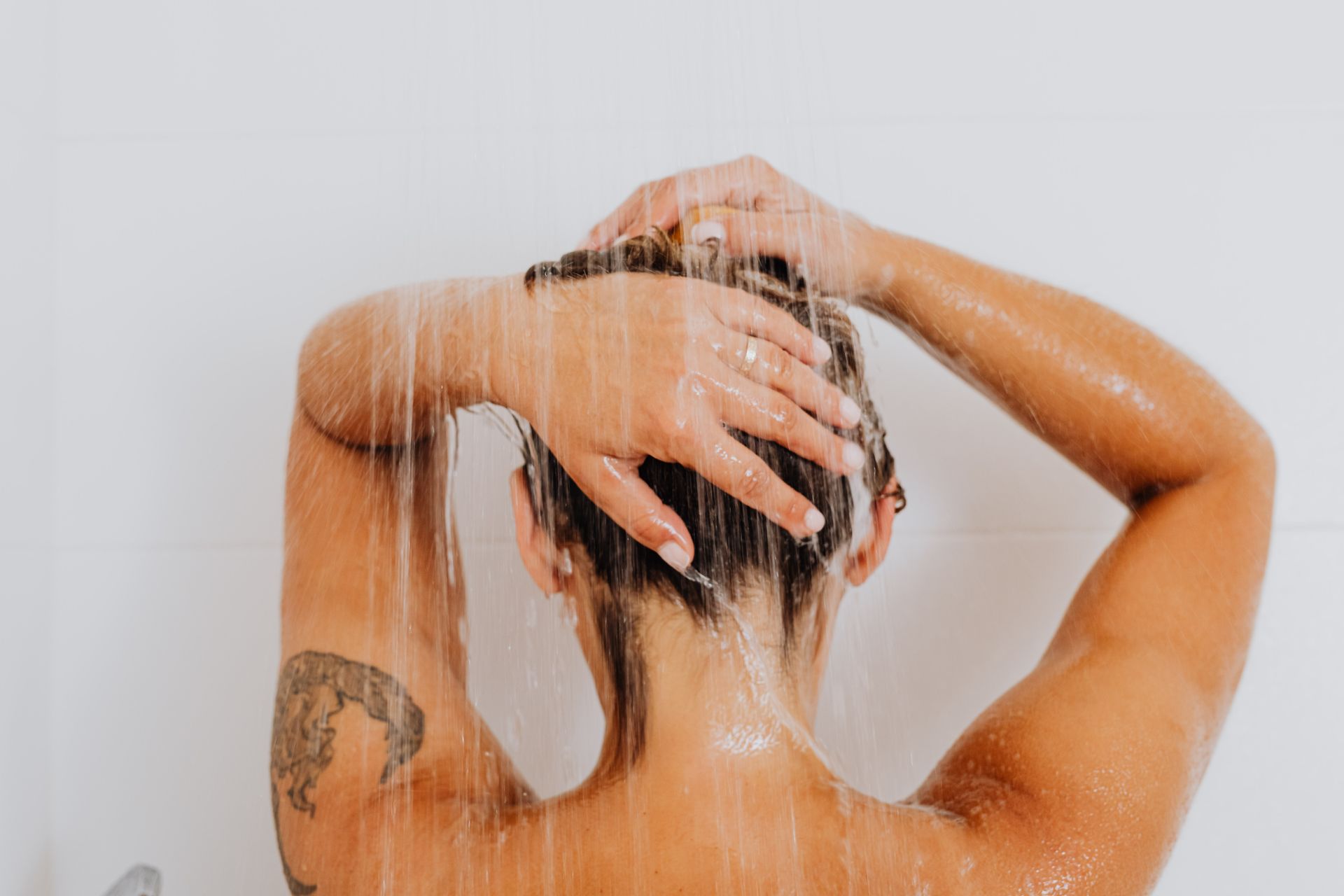 Back View of Woman in Shower
