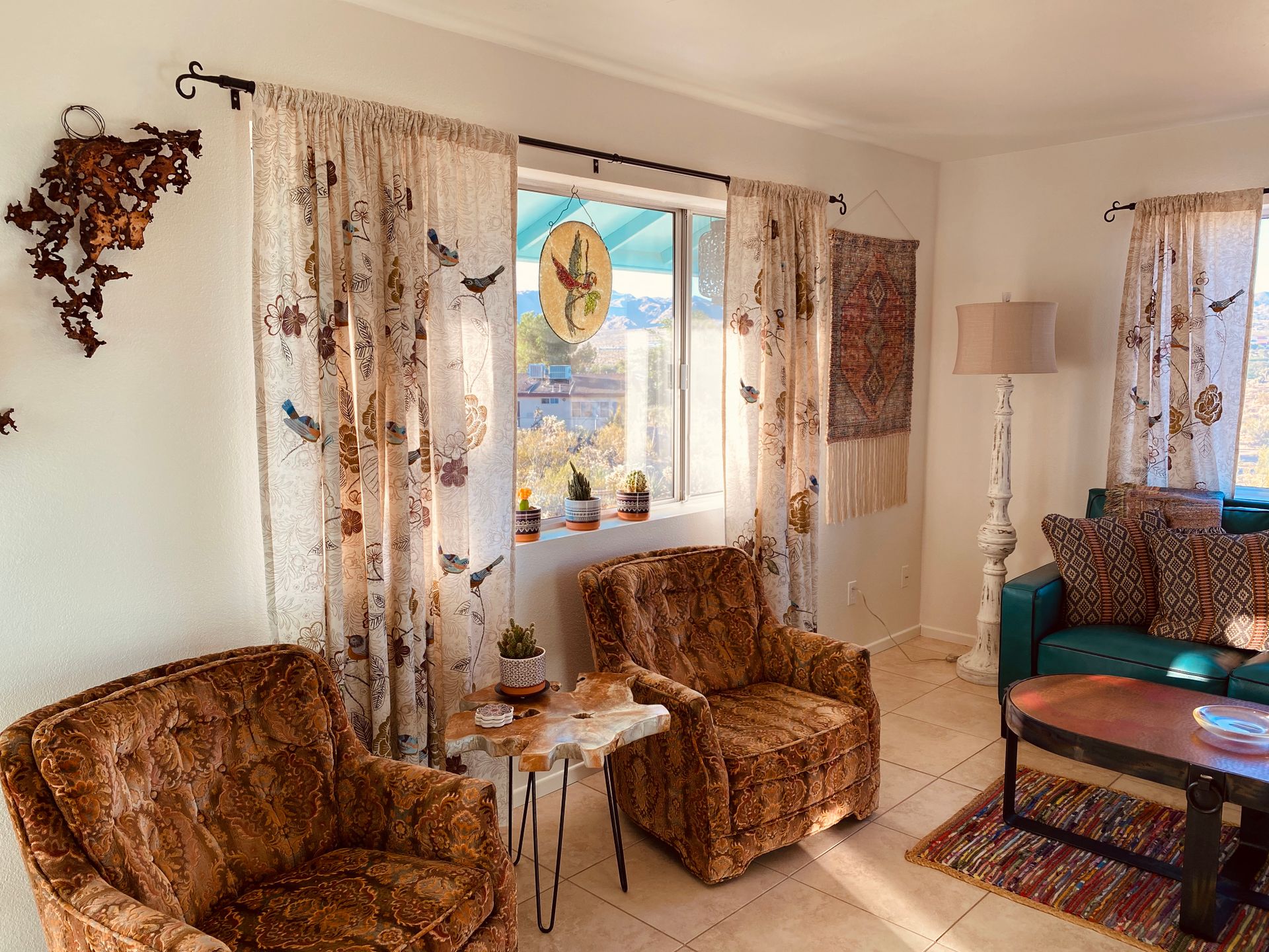 A charming vintage-style living room, featuring retro furniture and decor in Yucca Valley, CA.