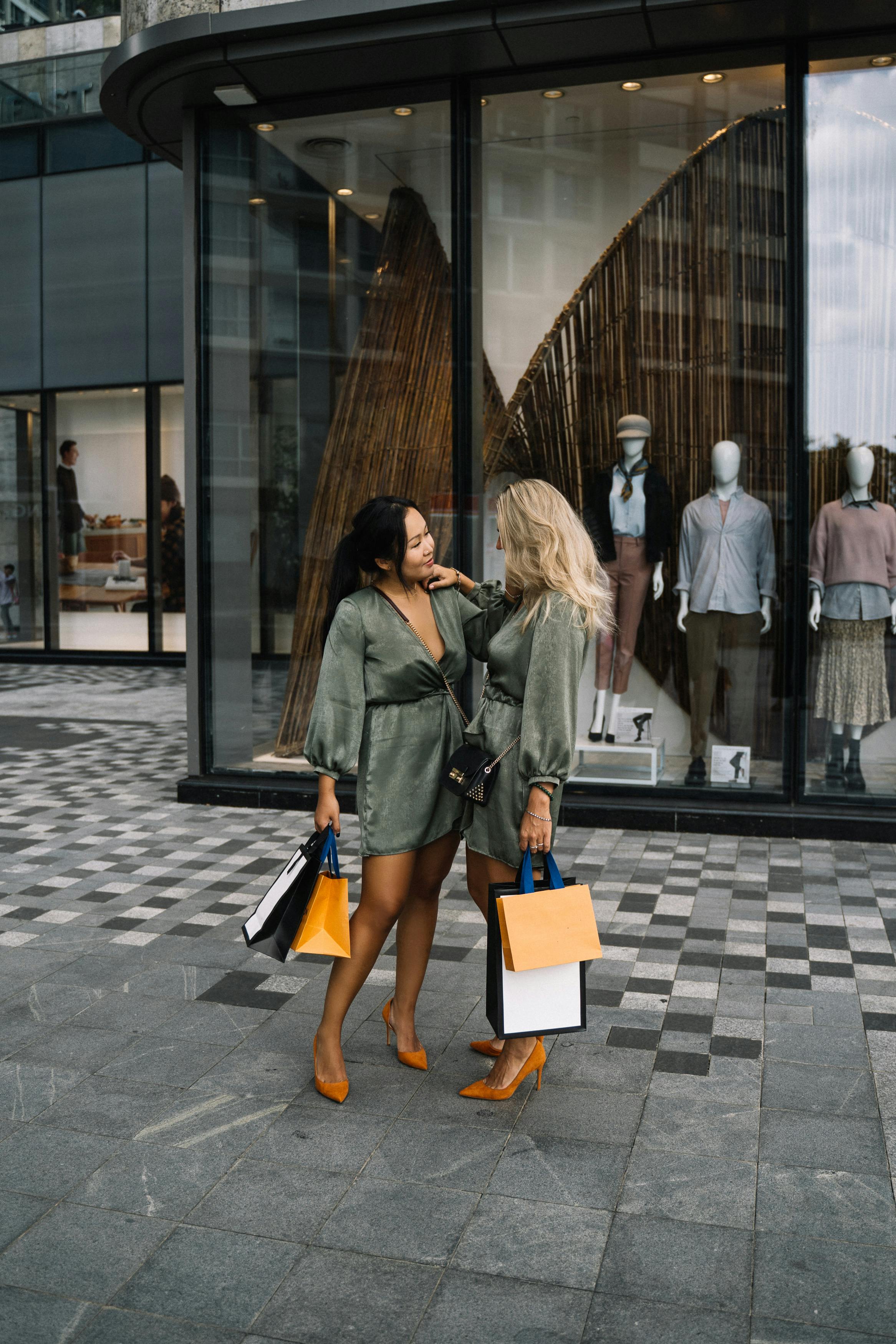  Woman walking in the street holding fashion handbag